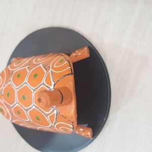 Homemade wooden turtles decorate children's desks